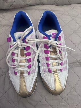 Nike White Sneakers with Gold and Pink Details